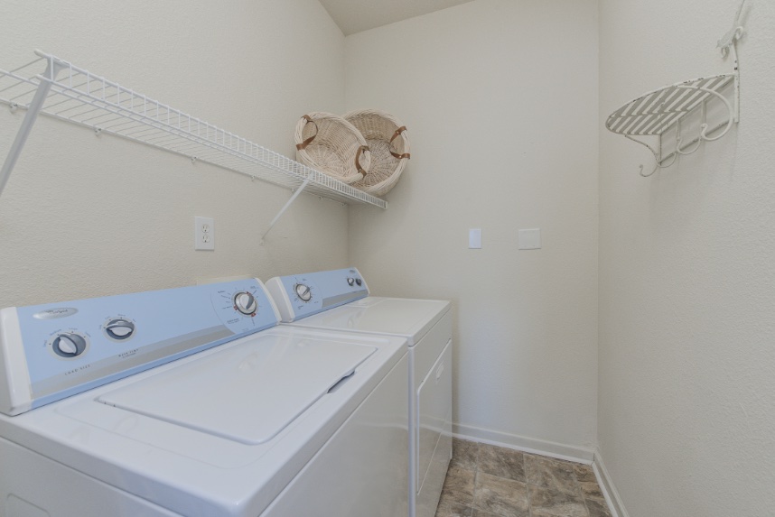 Laundry room with storage space in Noblesville.